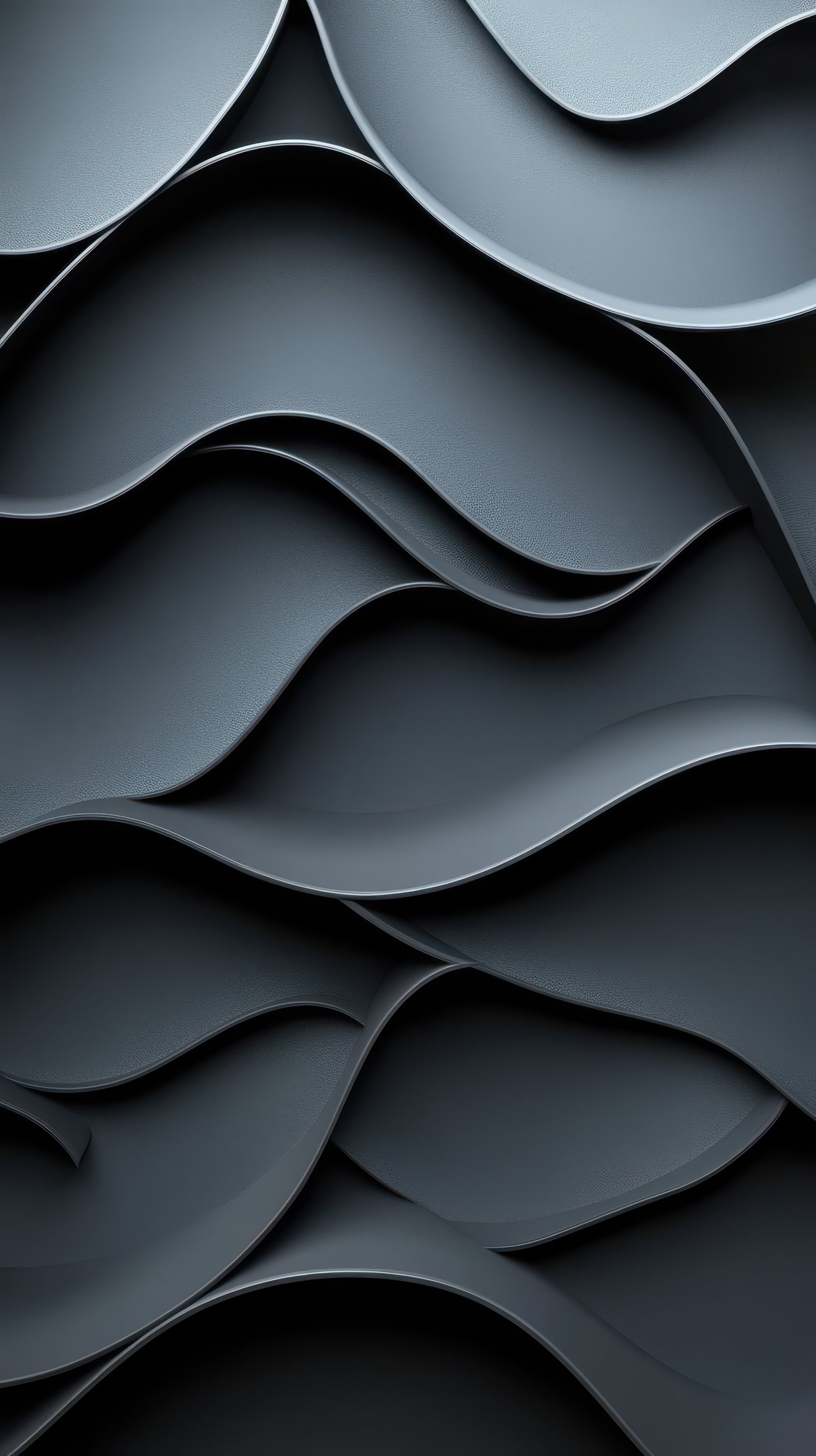 Textured black waves create a modern, artistic display in a contemporary interior setting